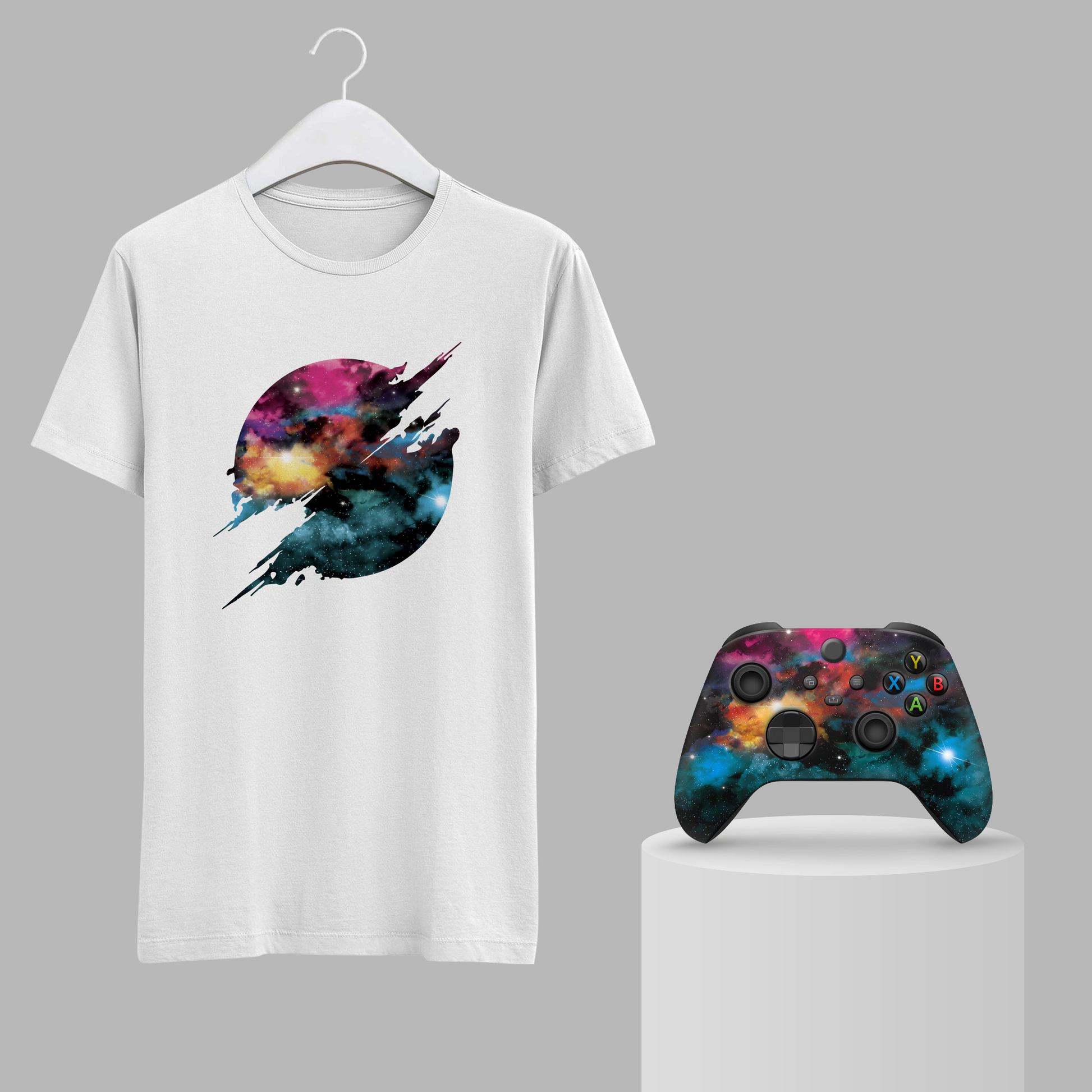 White T-shirt on hanger with galaxy jet graphic, paired with Xbox Series X controller