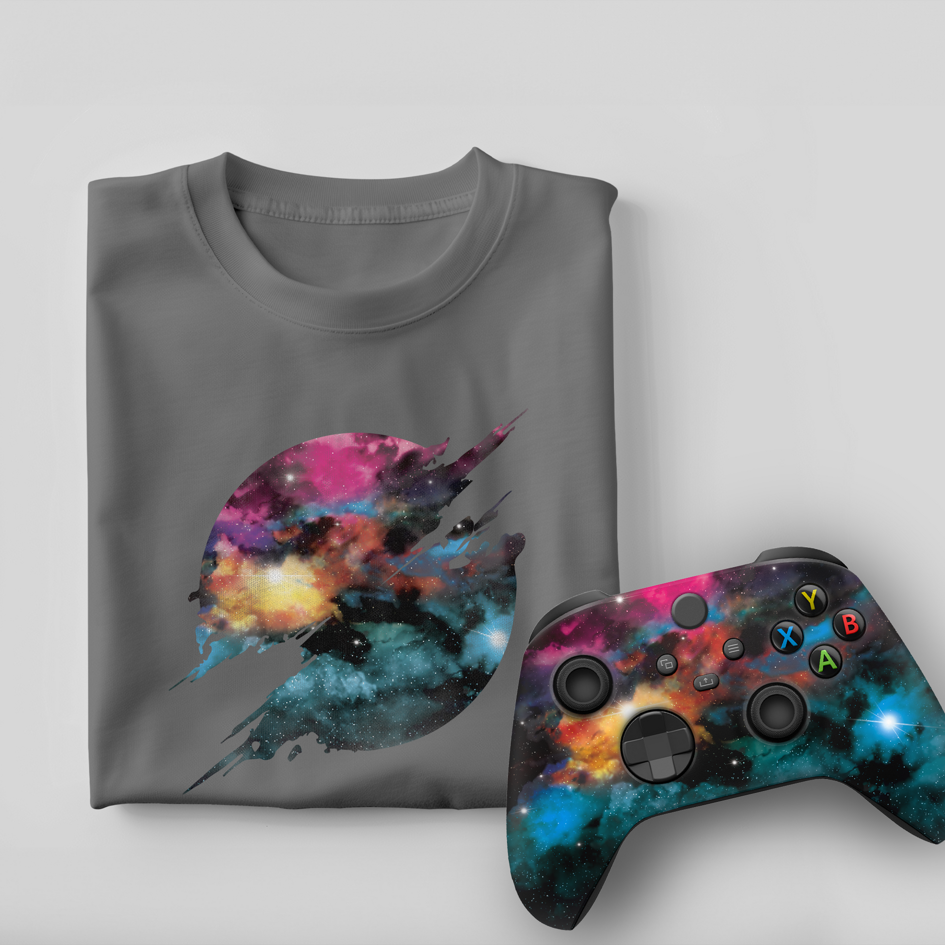 Black T-shirt with galaxy jet graphic and matching Xbox Series X controller (angled)
