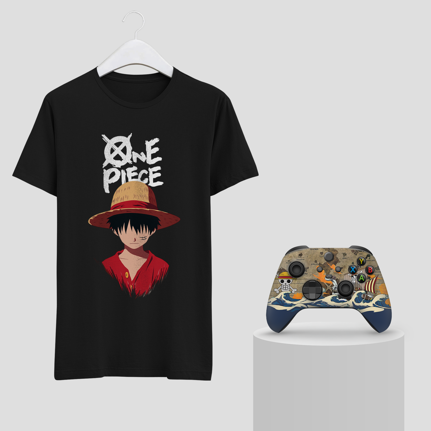 Black graphic T-shirt on hanger with character-in-hat print; Xbox controller.