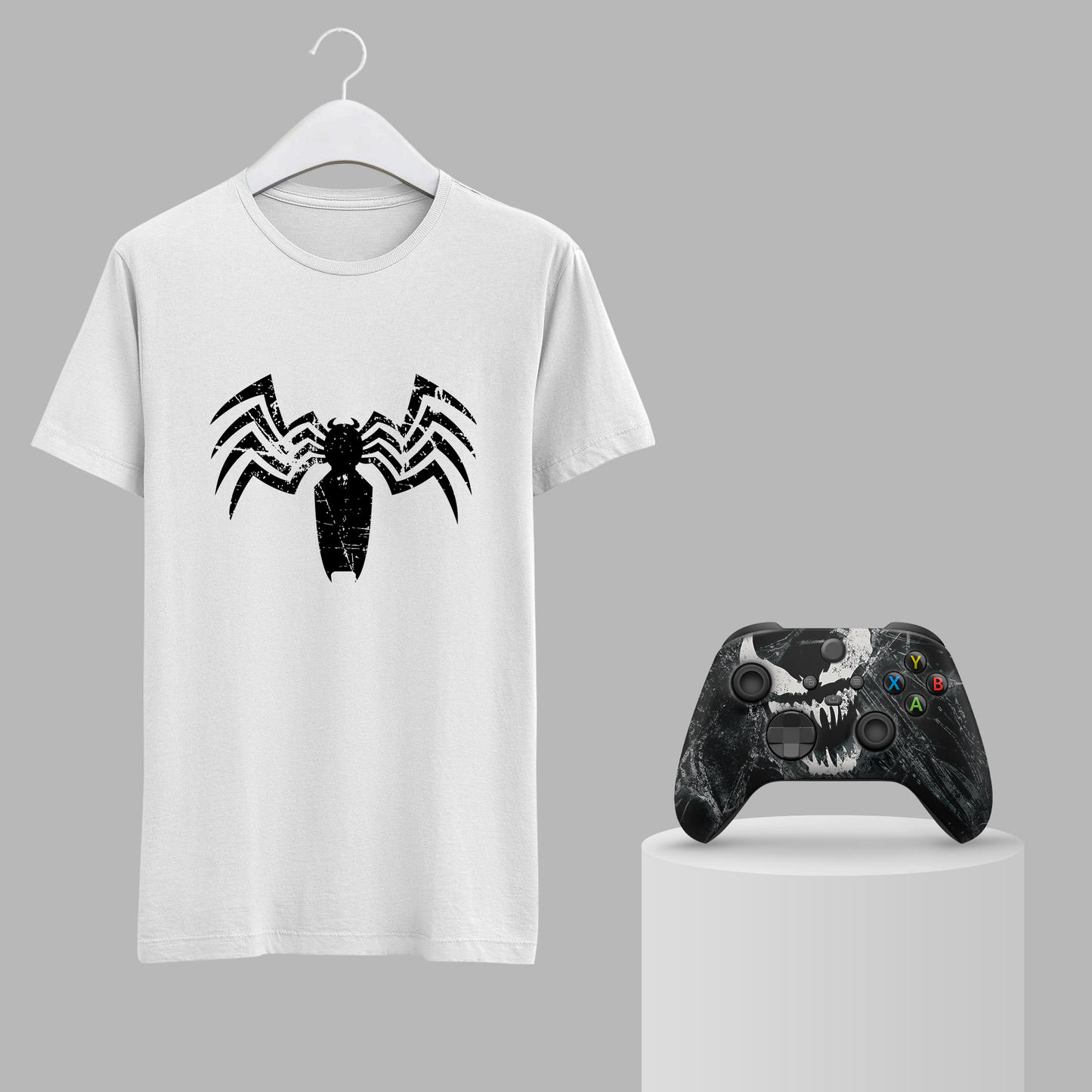 White venom graphic t-shirt on hanger with black Xbox controller