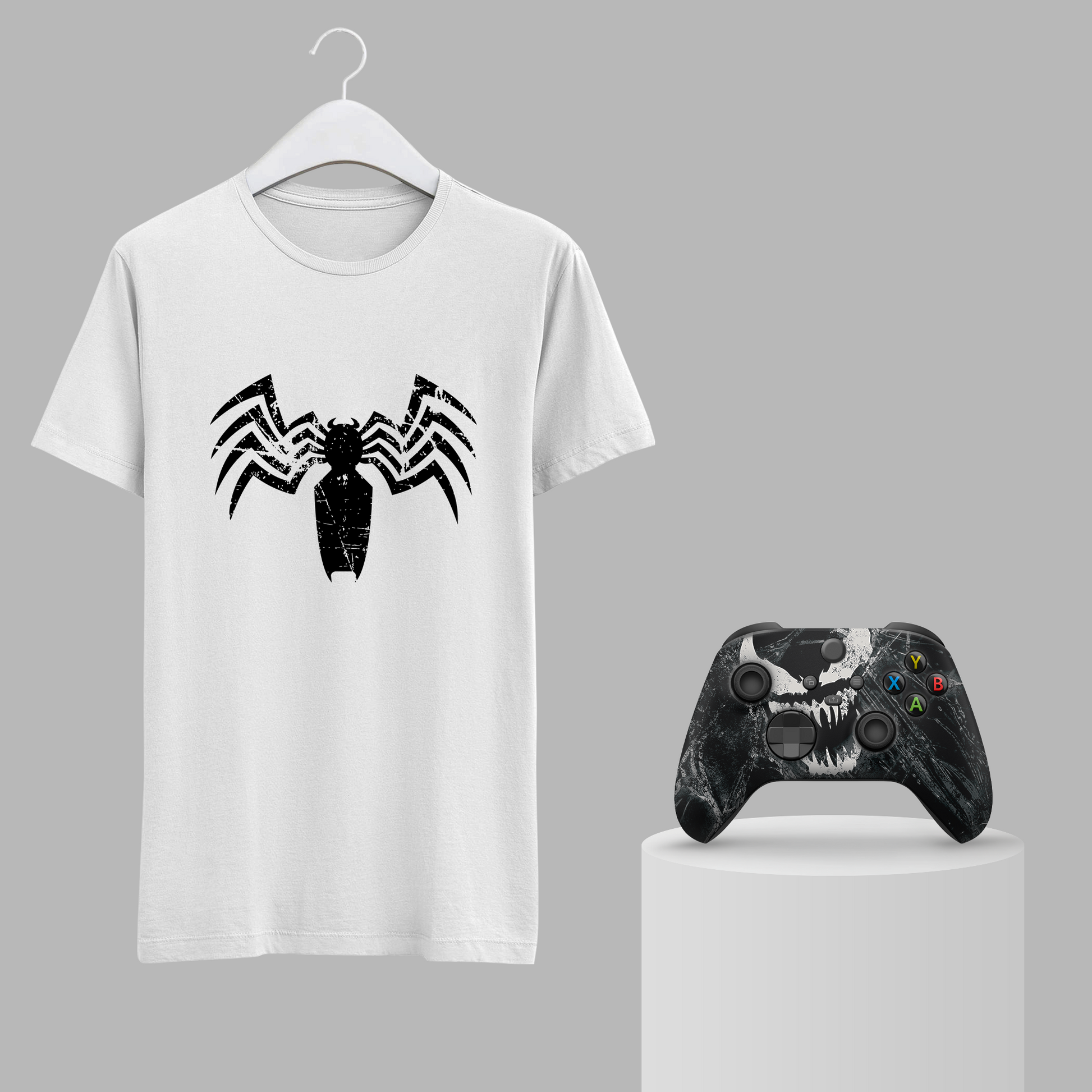White venom graphic t-shirt on hanger with black Xbox controller