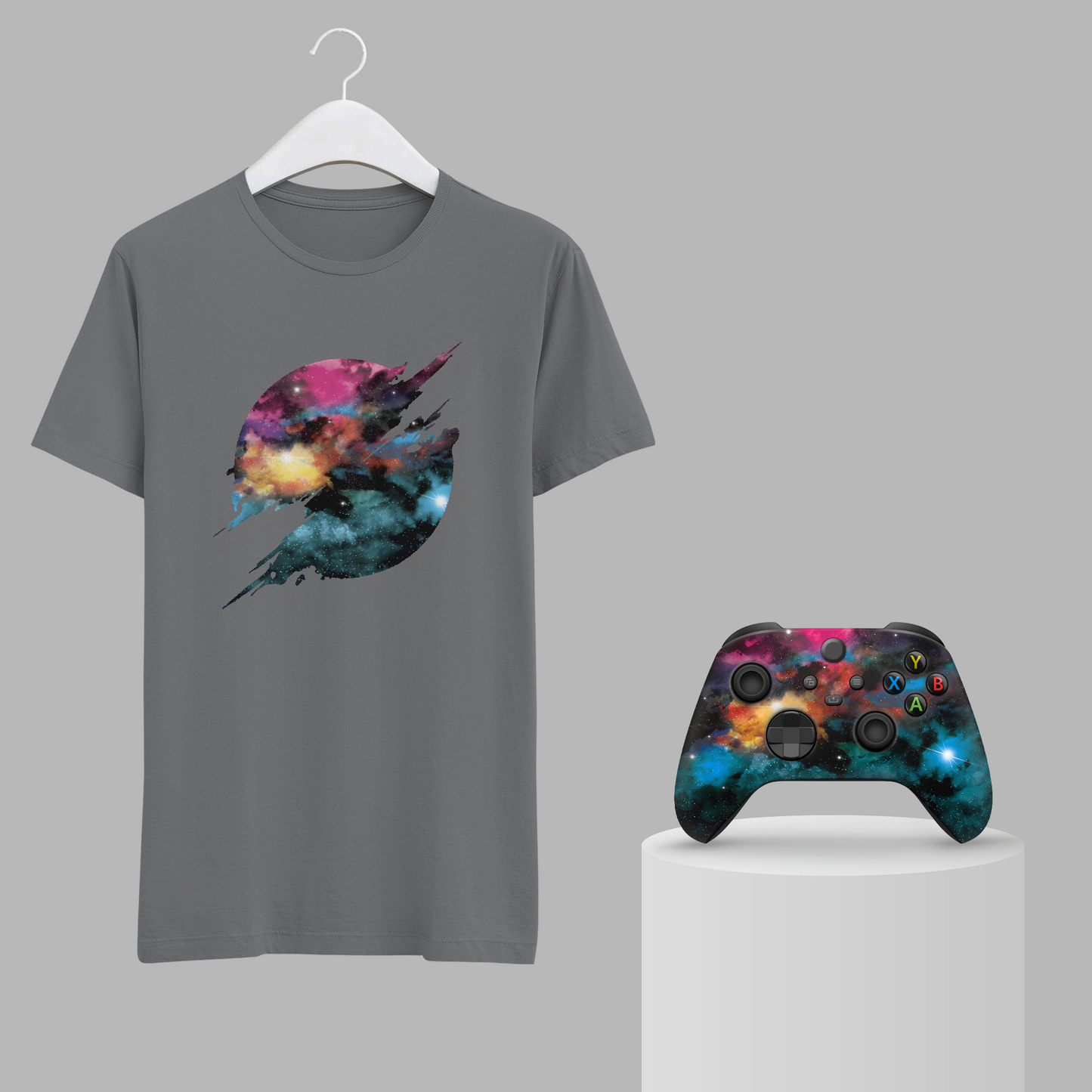 Gray T-shirt on hanger with galaxy jet graphic, paired with Xbox Series X controller