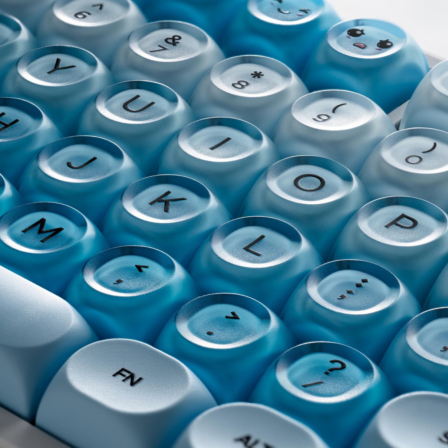 Blue translucent keycaps with printed legends, HOA profile, macro view