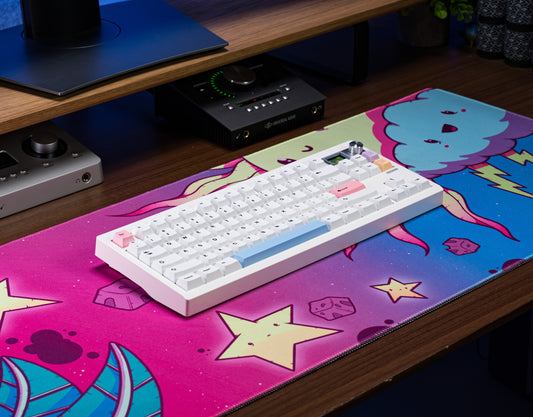 PBT keycaps set: white keys with pink, blue, and orange accent keycaps.