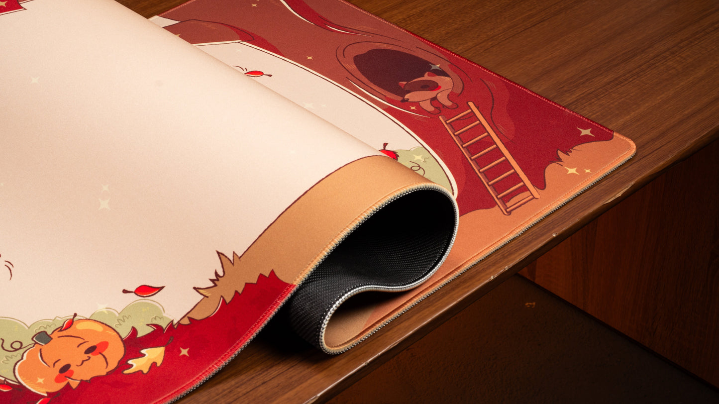 Pumpkin desk mat rolled edge, red border with pumpkin character, cream center and stars