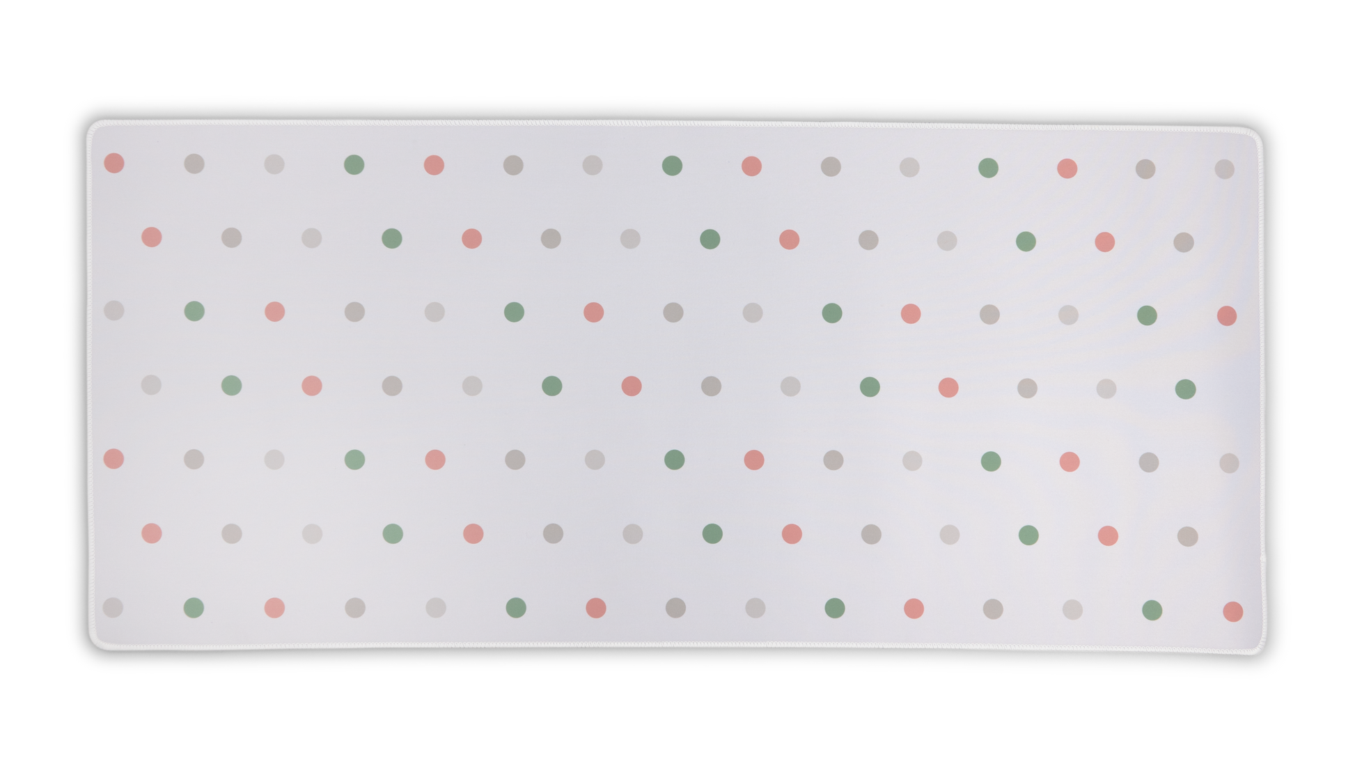 White desk mat with multicolor polka dots and rounded corners