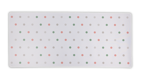 White desk mat with multicolor polka dots and rounded corners