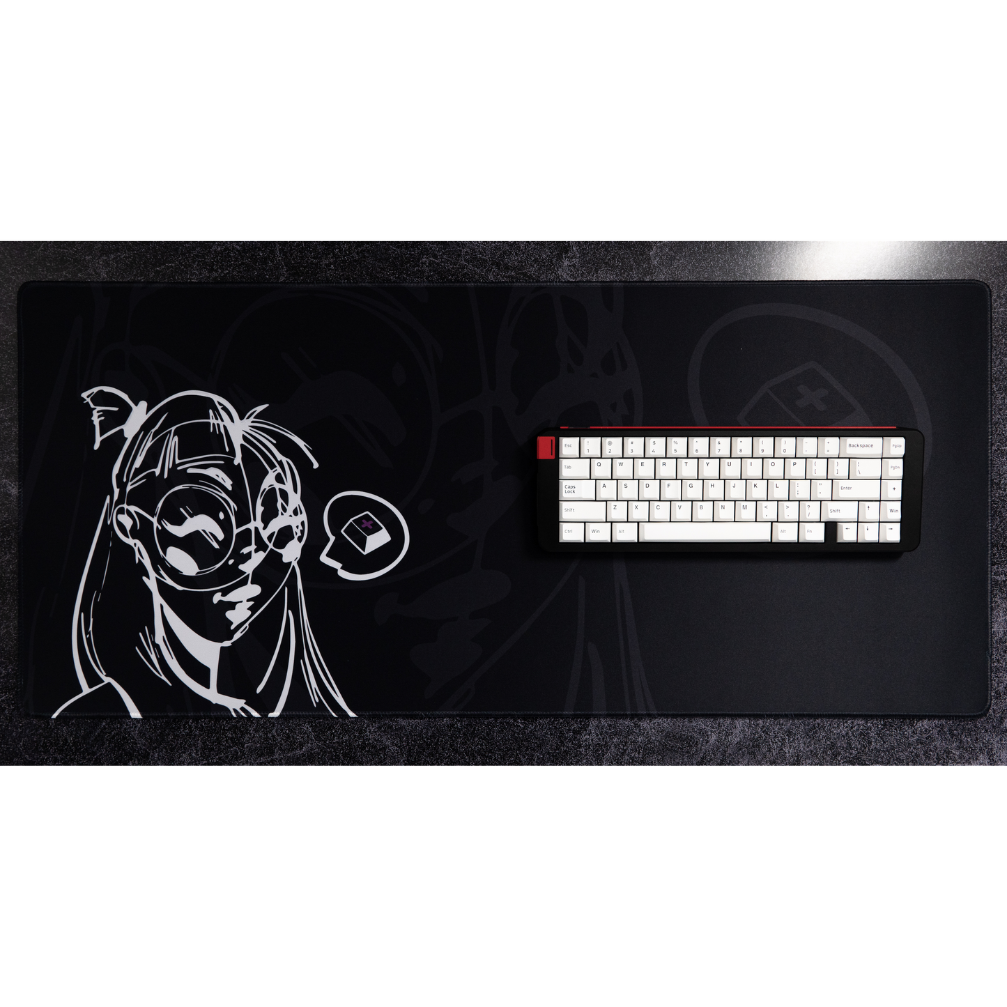 Large black desk mat with white anime portrait print and gaming icon