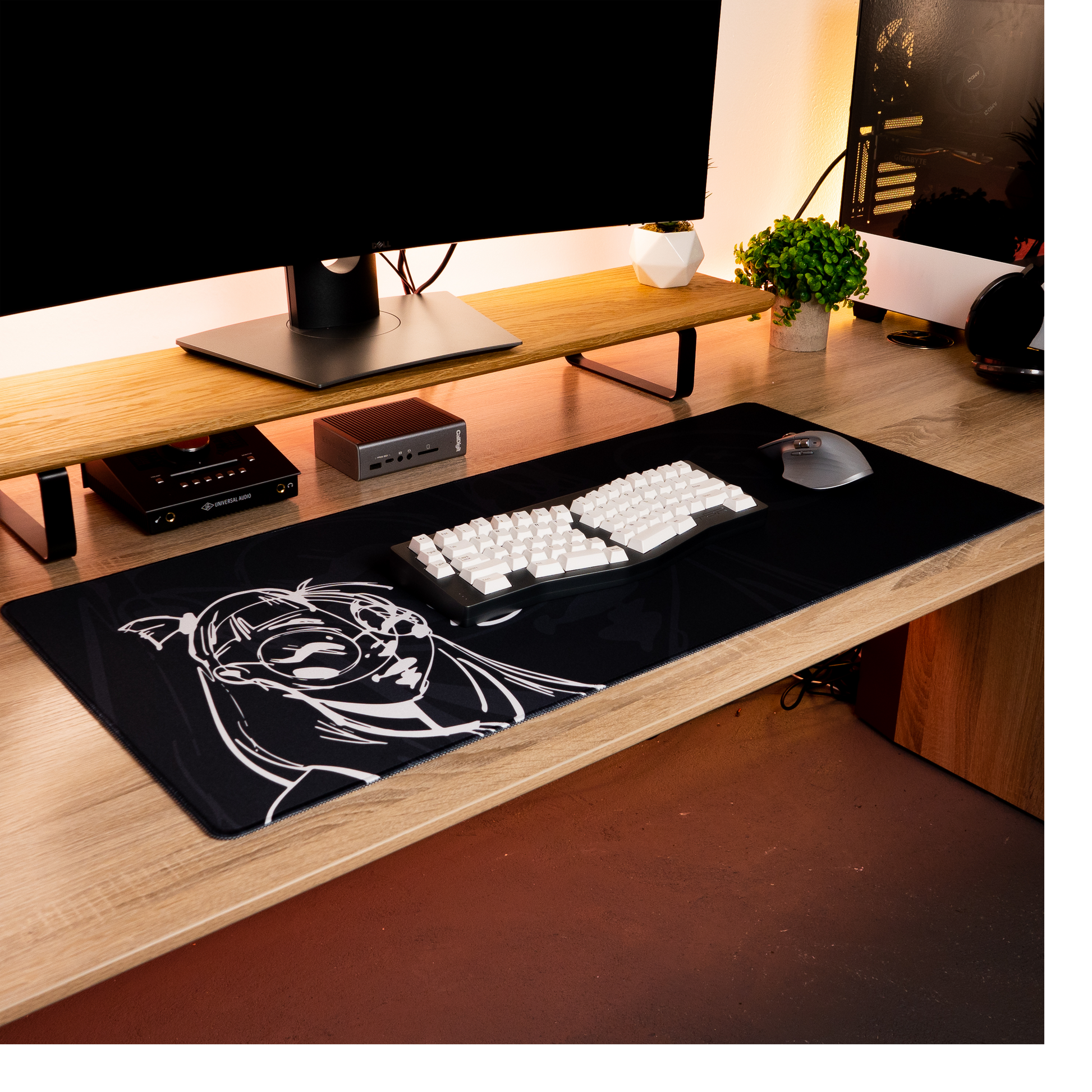 Black desk mat with white anime-style portrait graphic for keyboard and mouse use