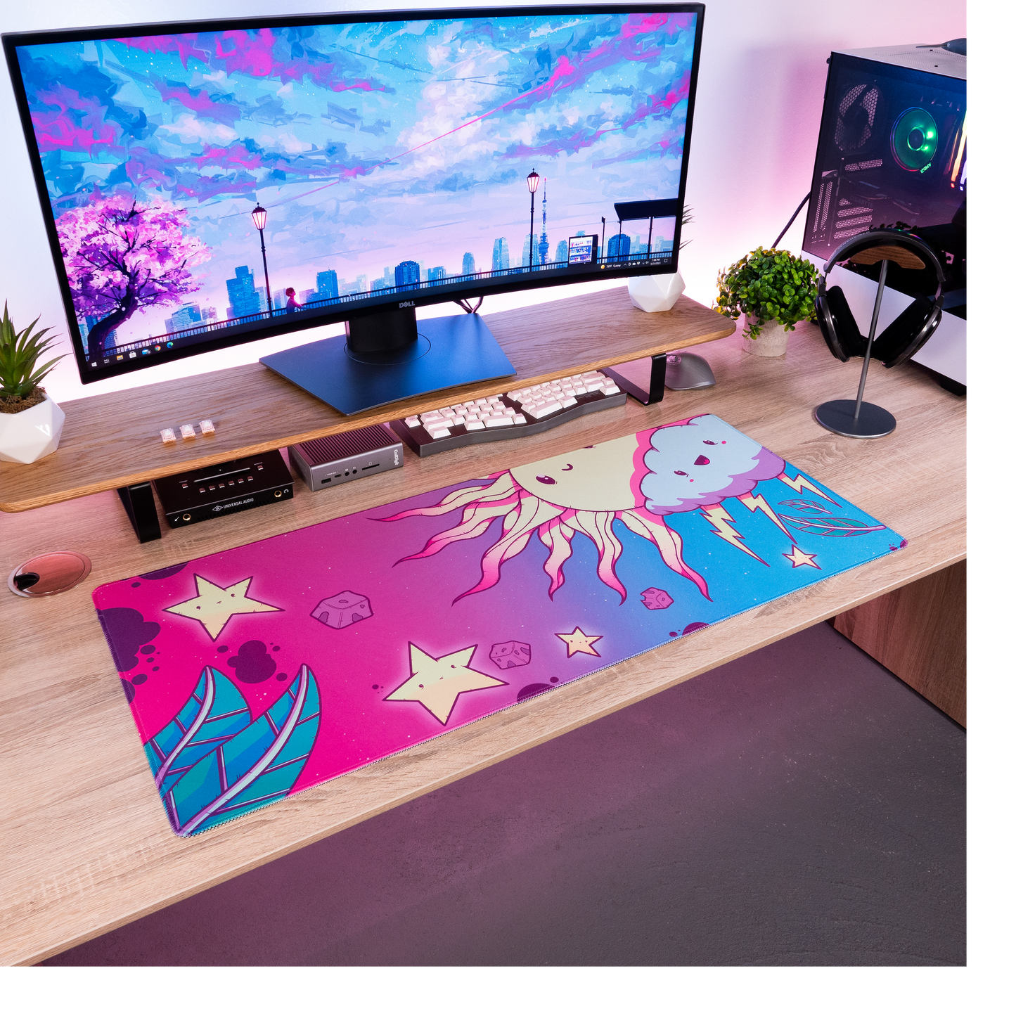 Full desk setup with cartoon desk mat featuring cloud character, stars, and lightning
