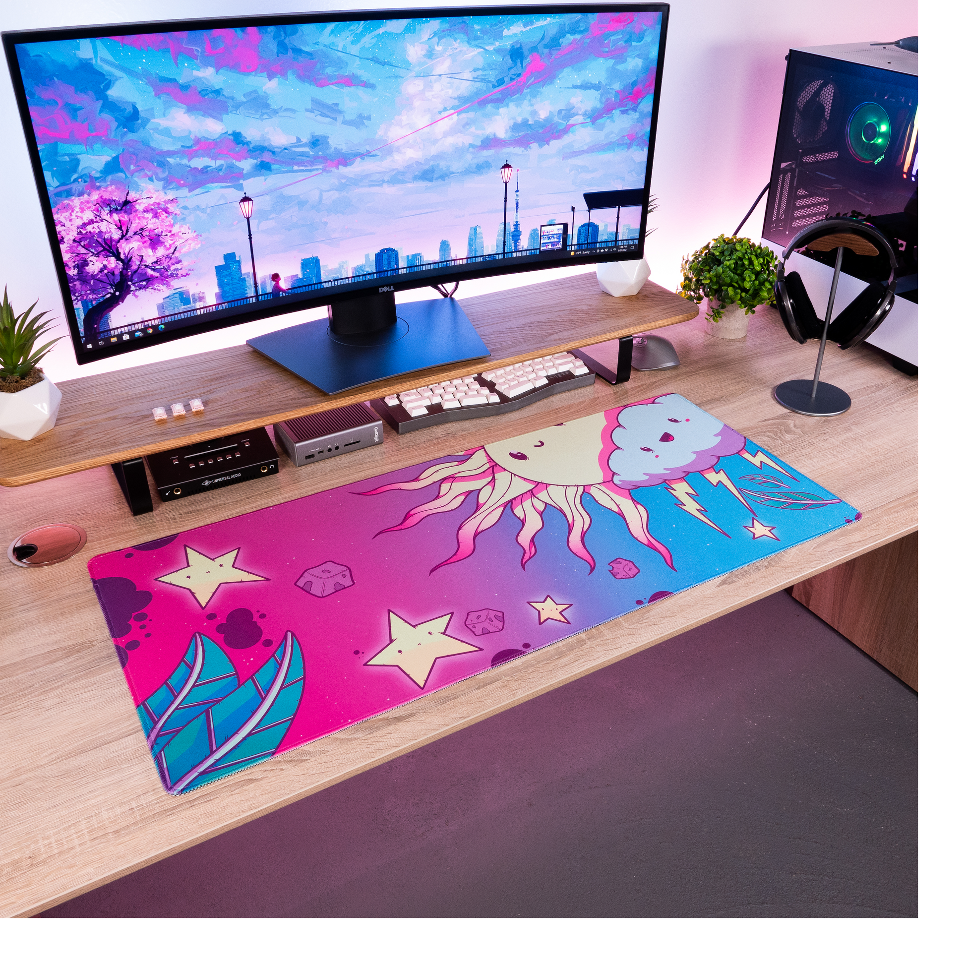 Full desk setup with cartoon desk mat featuring cloud character, stars, and lightning