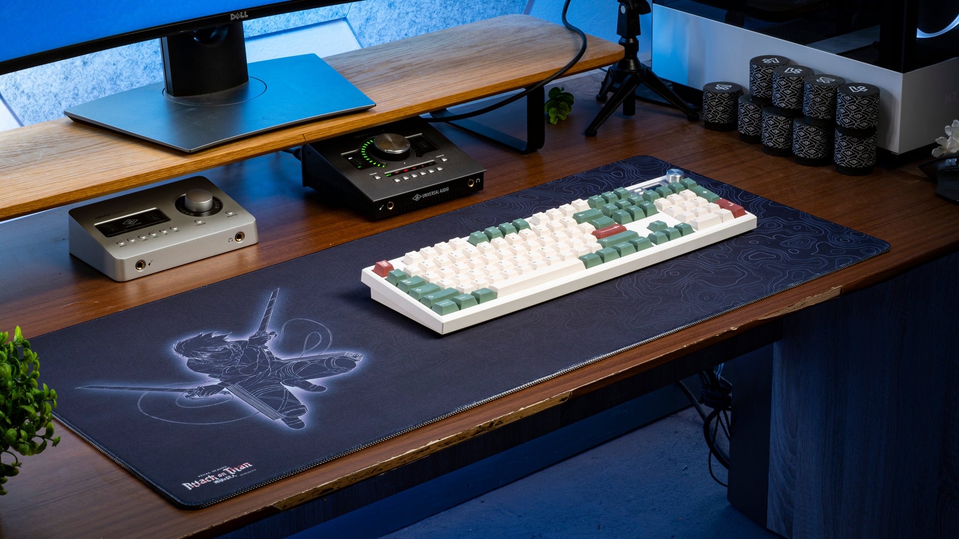Dark blue anime desk mat with character silhouette line art and swirling contour pattern