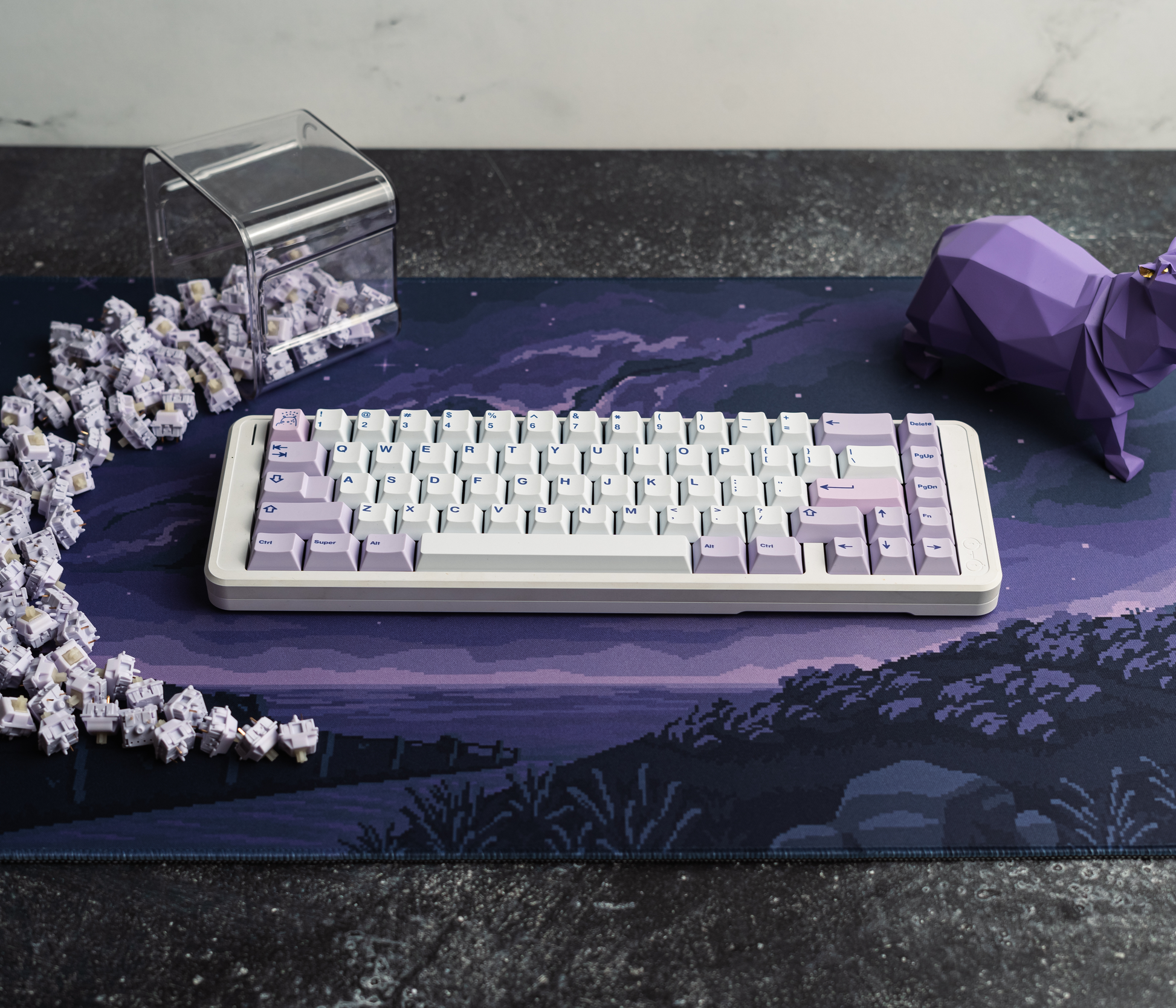 PBT keycap set on keyboard base, white keys with lilac accent caps and blue legends