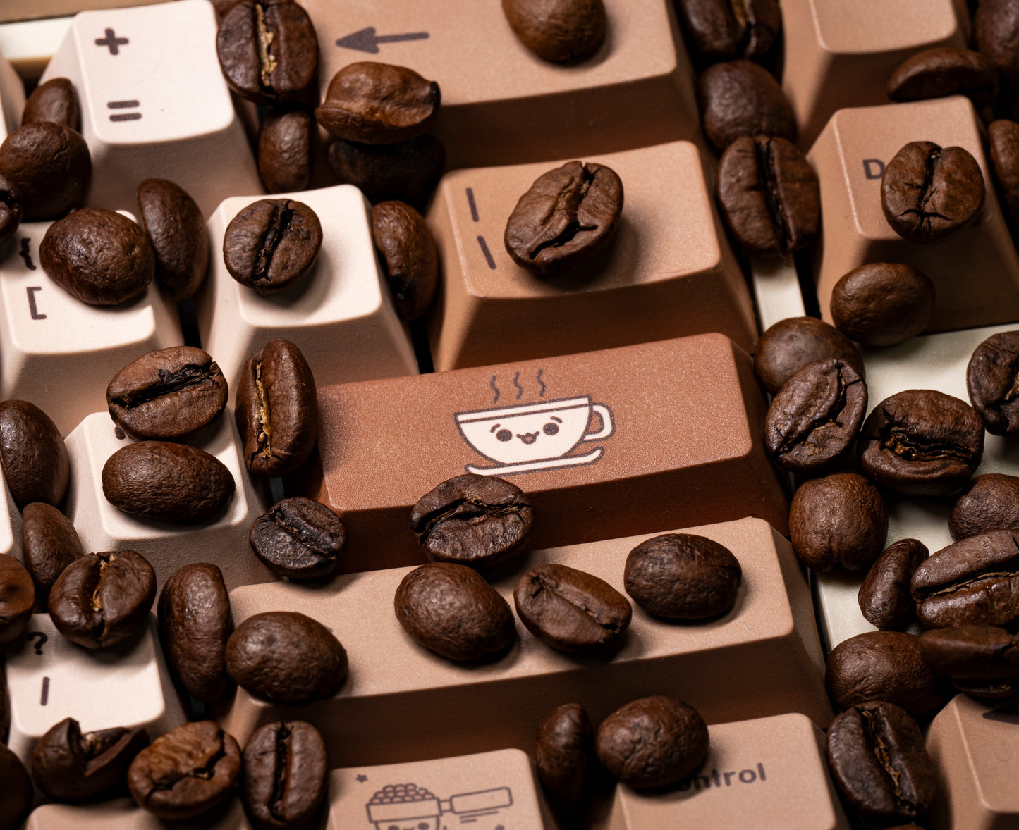 Coffee-themed PBT keycaps close-up with coffee-bean decor on beige and brown keys