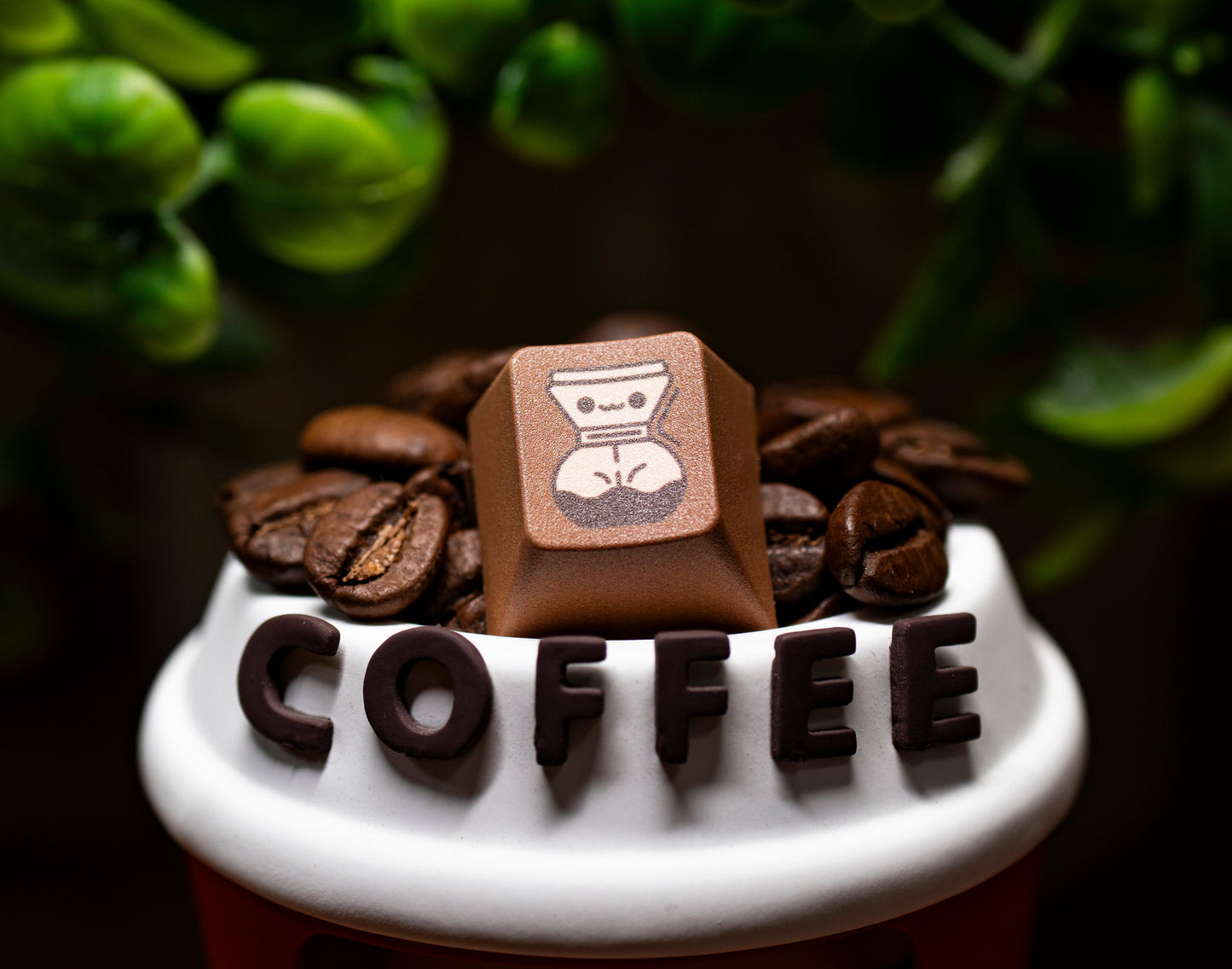 Coffee-themed PBT keycap with “COFFEE” letters and cup icon, surrounded by coffee beans