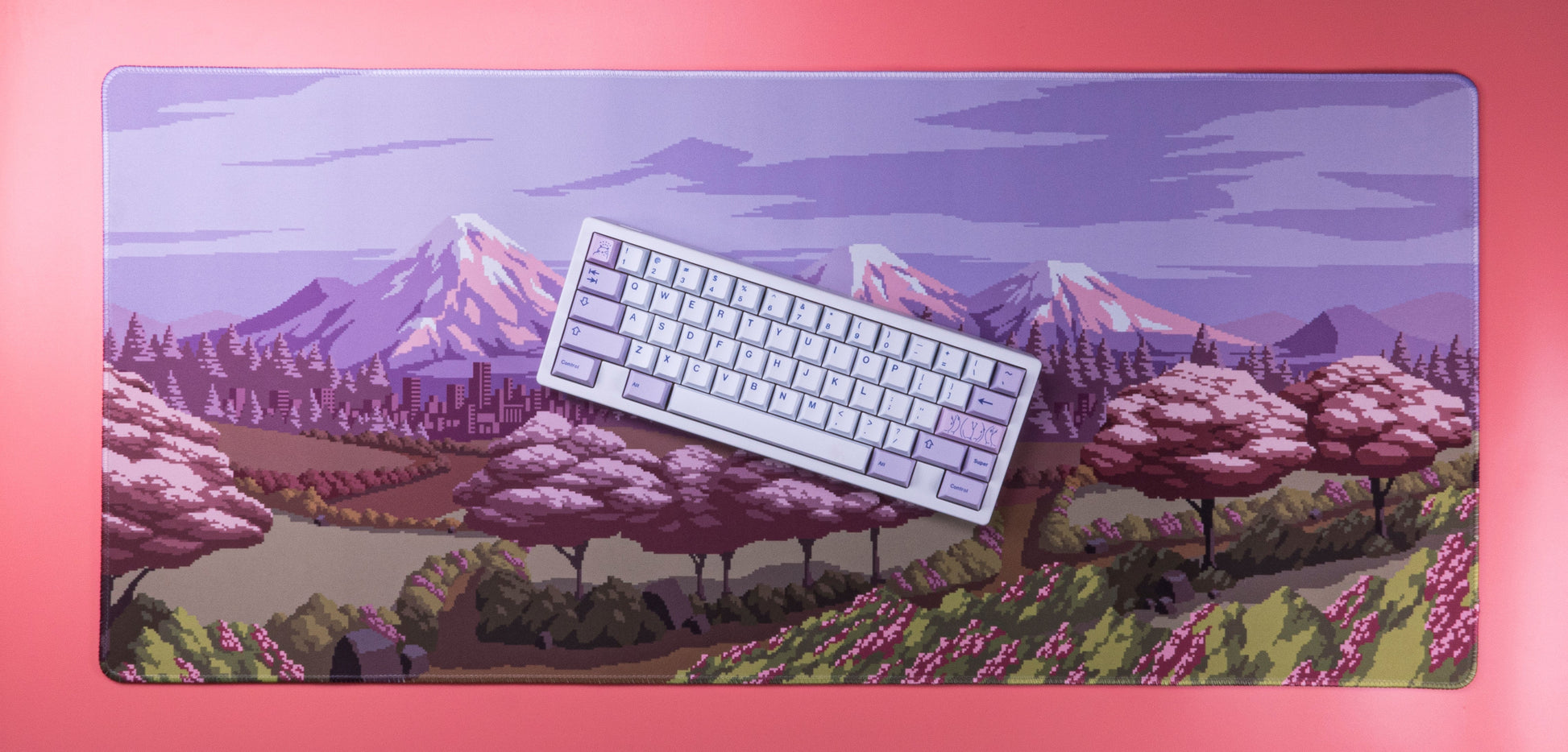 Spring Time desk mat with lavender backing and pixel art spring landscape