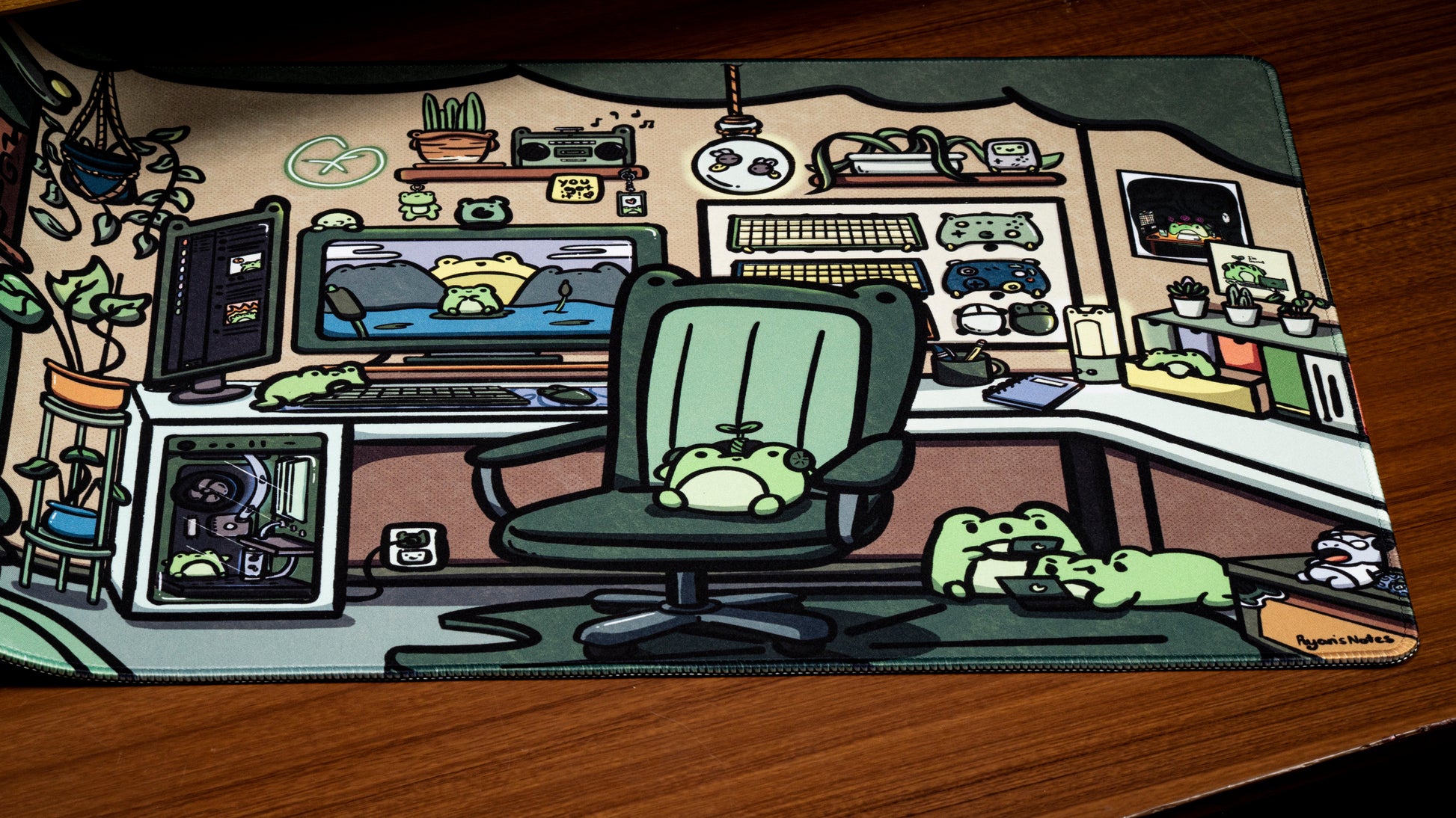 Frog-themed office desk mat showing cartoon green chair and office shelves