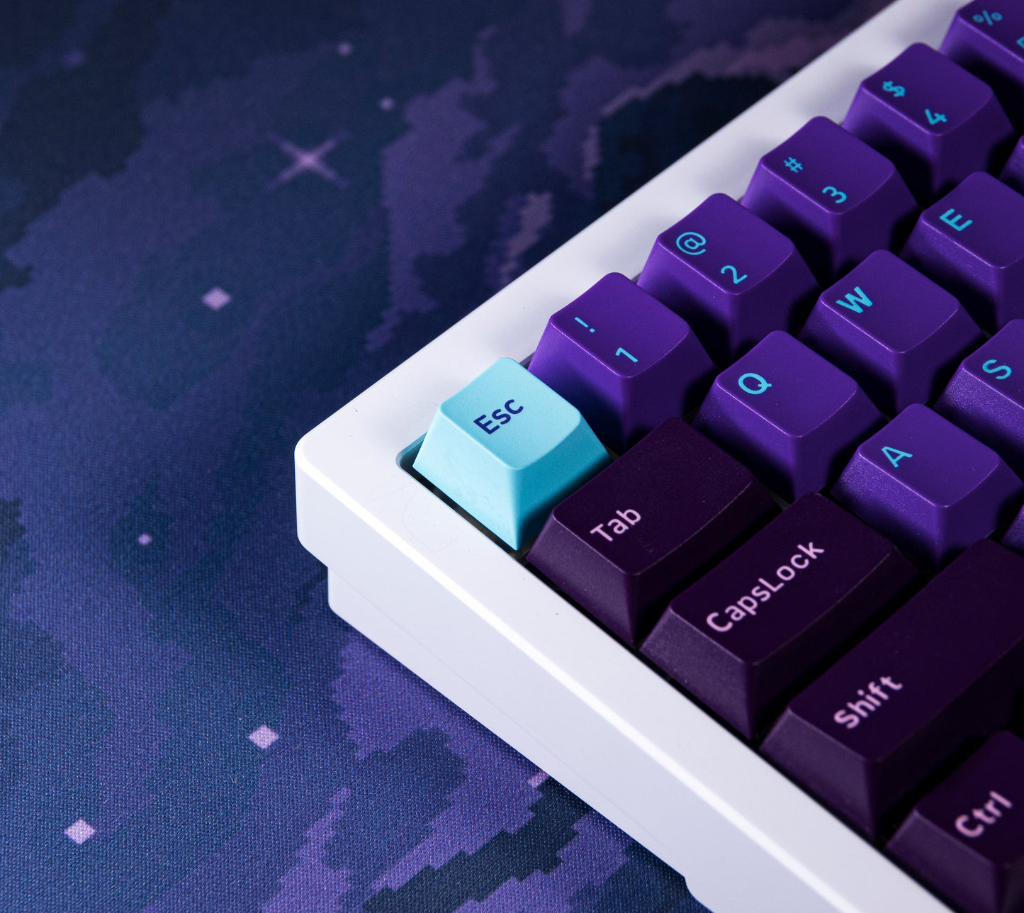 Galaxy PBT keycaps close-up with light-blue Esc key and purple Tab/Shift keys