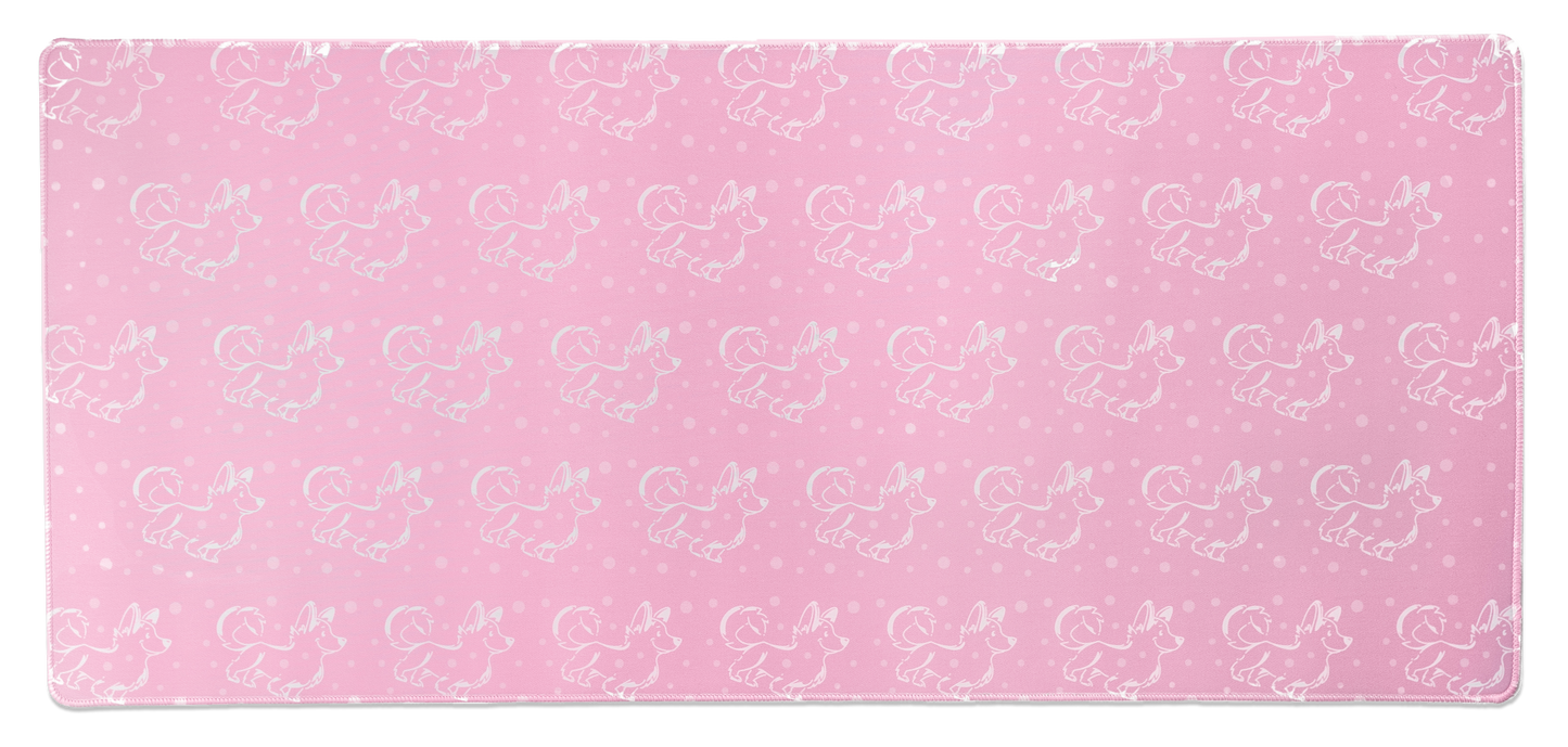 Pink desk mat with repeating white corgi pattern, full view with stitched border