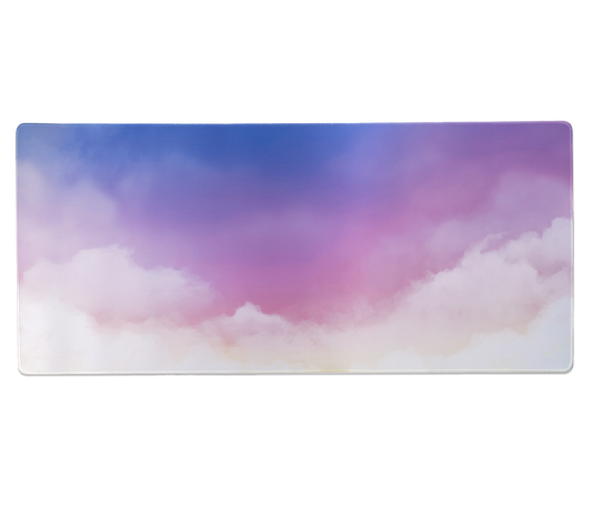 Rectangular desk mat with pastel cloud gradient in blue, purple, and pink