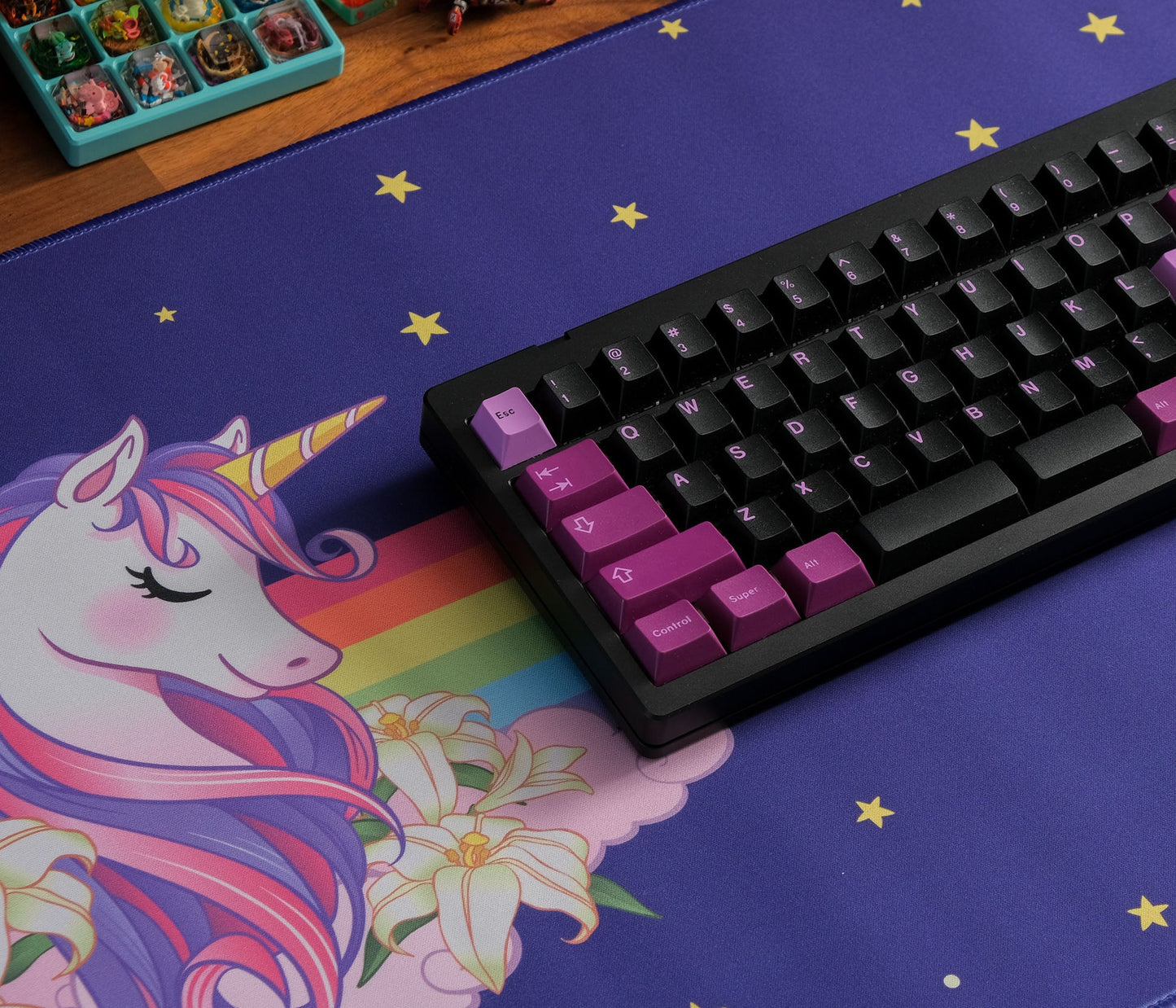 Rectangular unicorn desk mat, navy blue with gold stars and keyboard-friendly surface