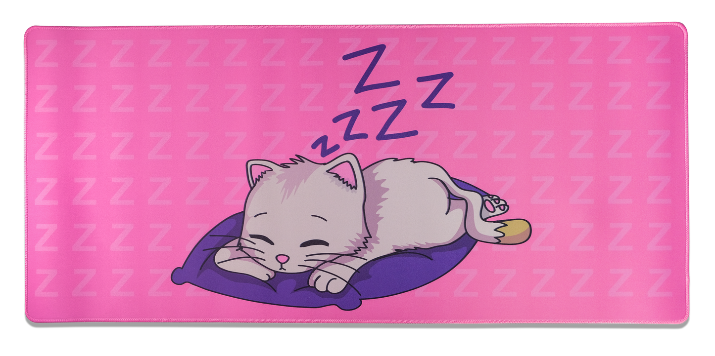 Pink desk mat with sleeping kitten and ZZZ marks, rounded corners and stitched trim
