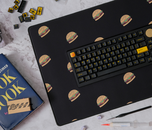 Burger-printed desk mat with rounded edge and black surface