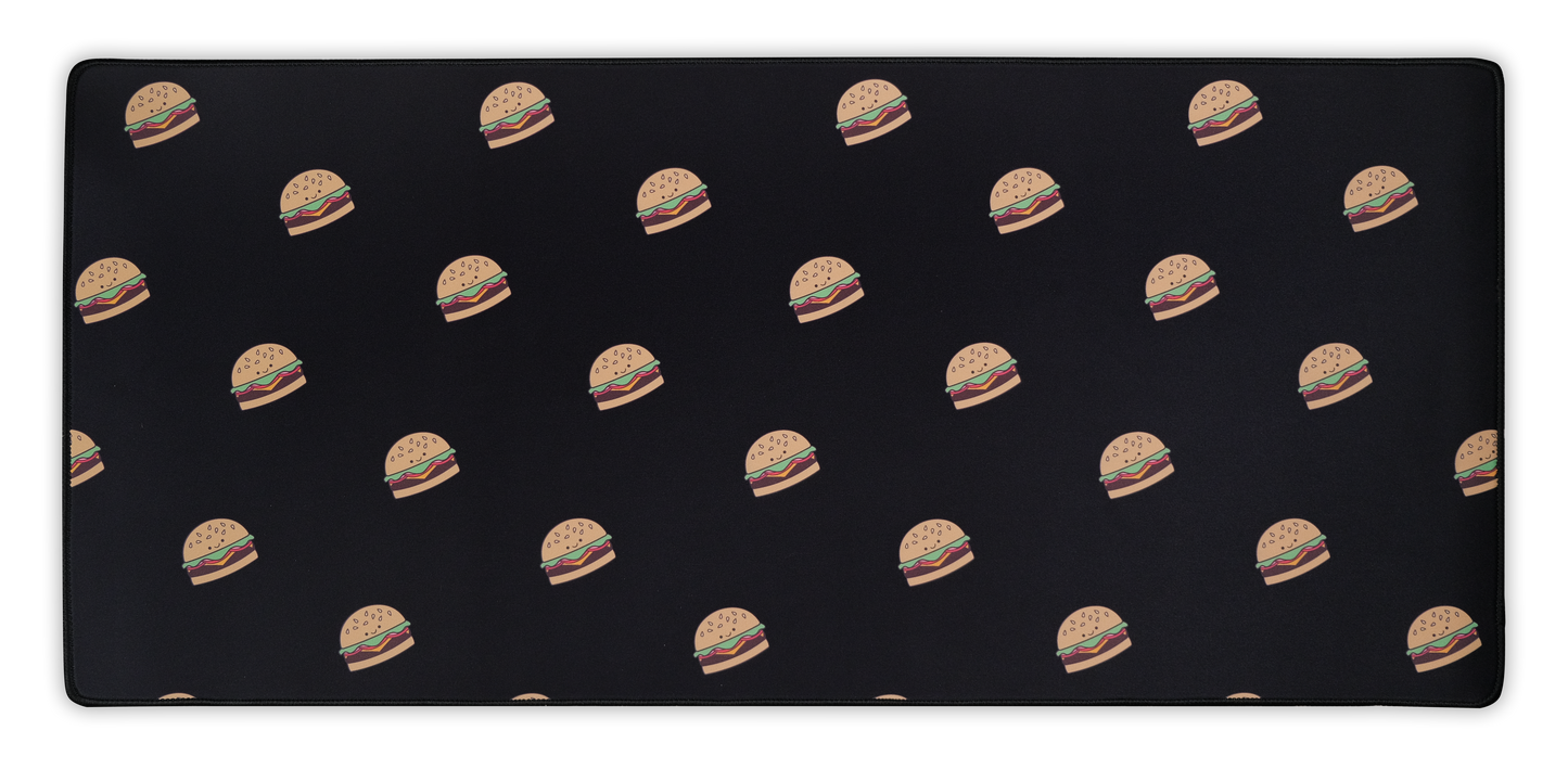 Burger-printed desk mat with black surface and repeated burger pattern, full view