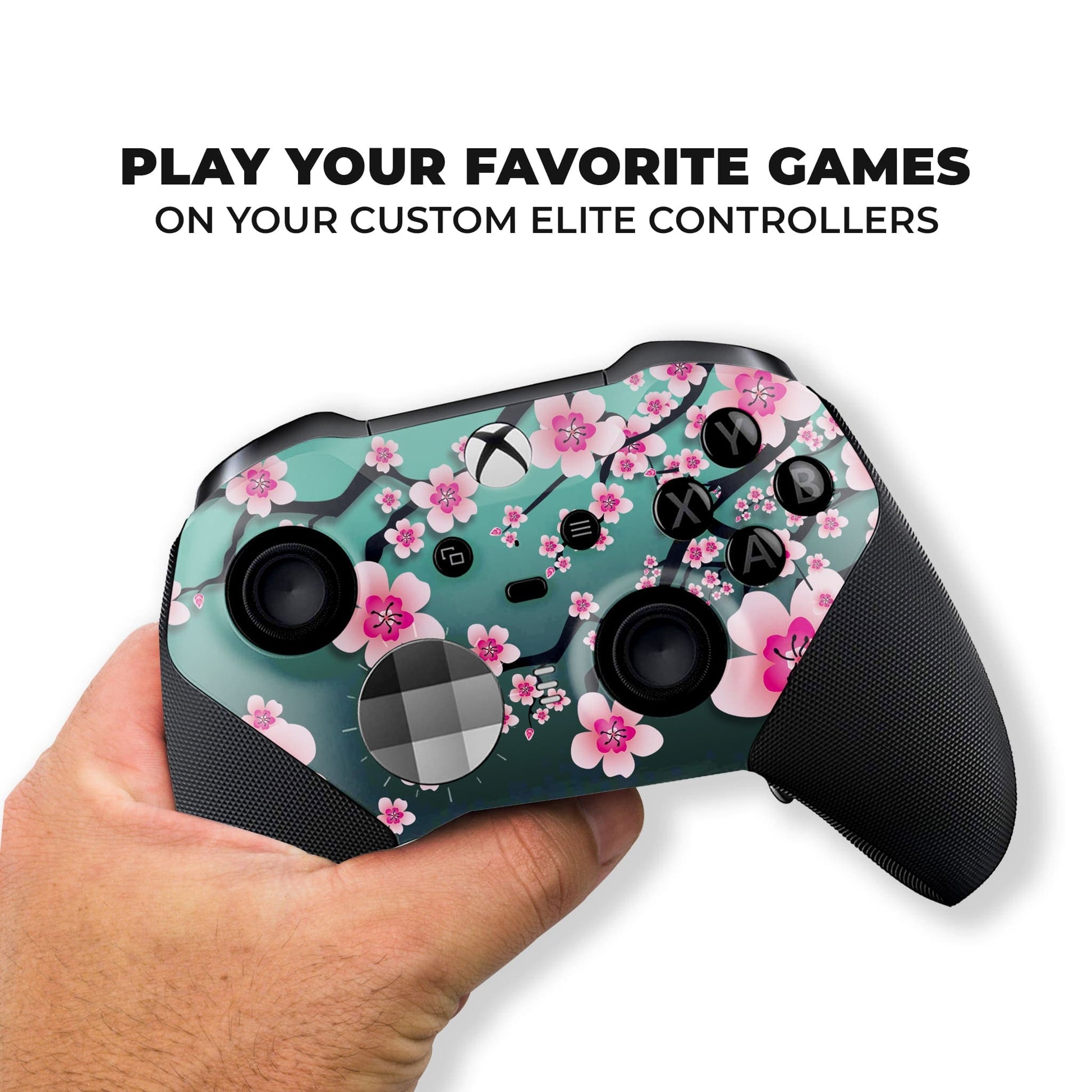 Xbox Elite Series 2 controller in hand with hydro-dipped cherry blossom floral front