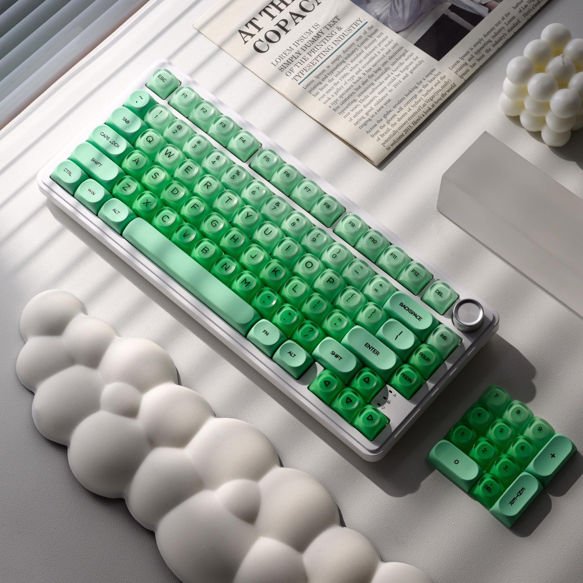 Translucent HOA profile keycap set on keyboard tray, mint green legends, 132 keys
