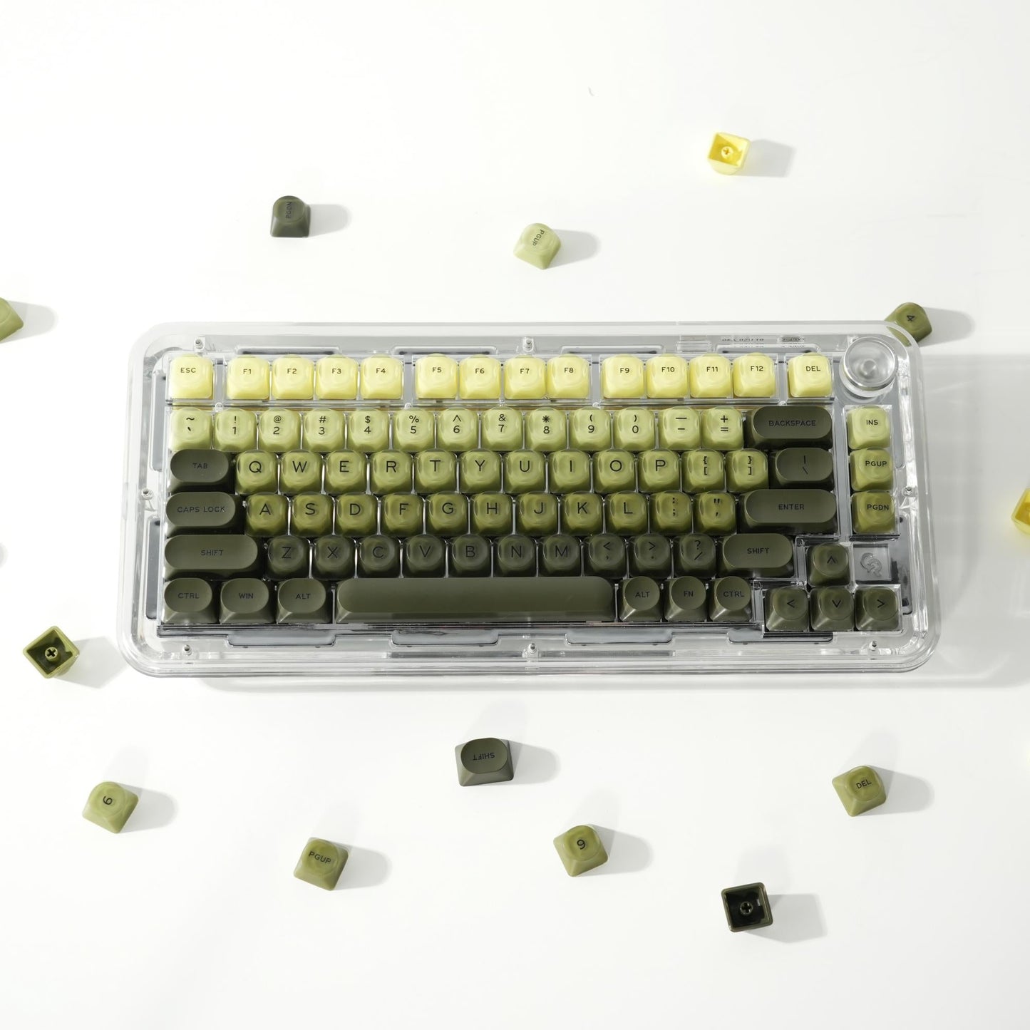Translucent keycap set, green-yellow tones, 132 keys, in clear storage case