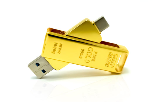 Gold bar USB 3.1 flash drive with metal cap, shown with USB-A connector attached.