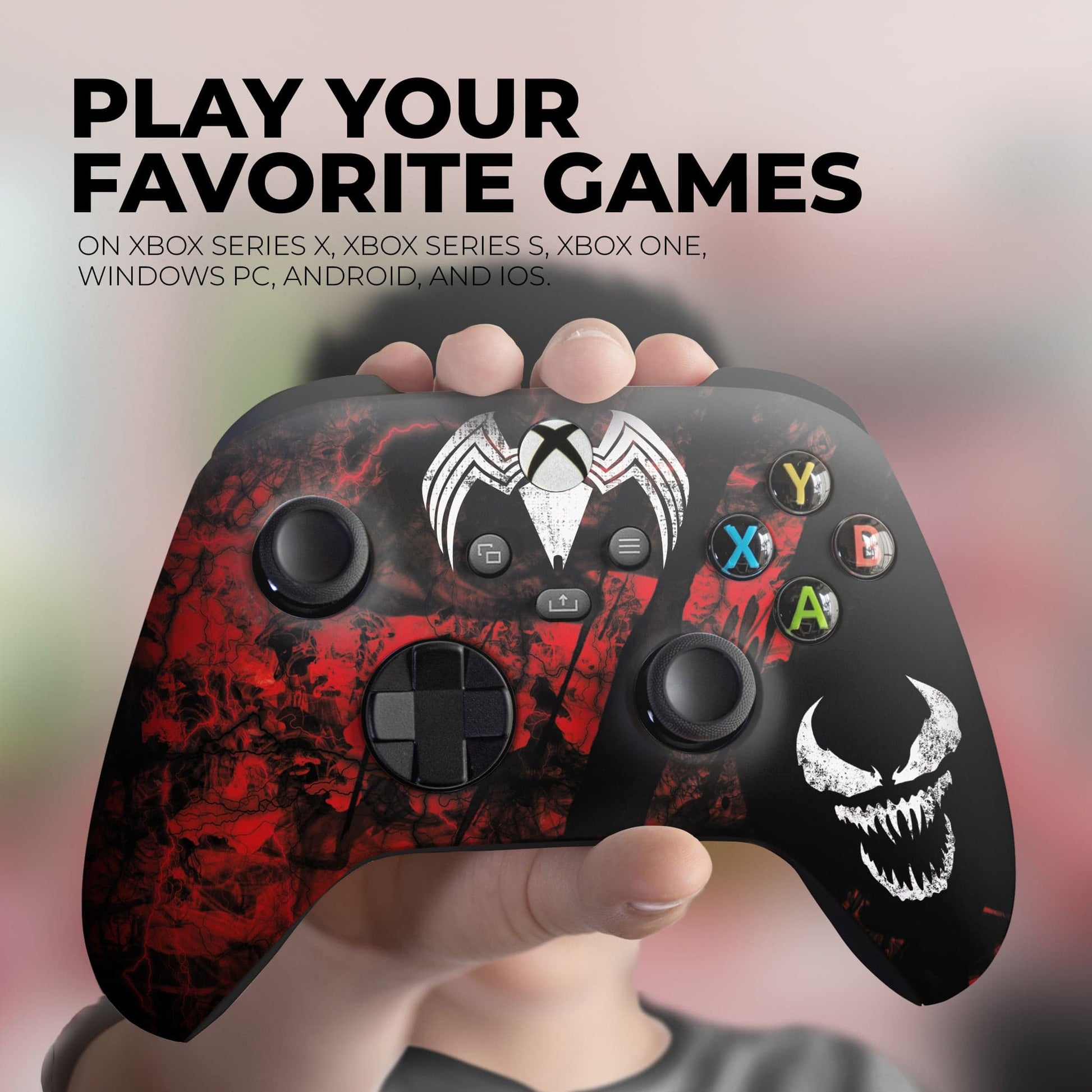 Xbox Series X/S wireless controller in hand, red-and-black carnage print with skull