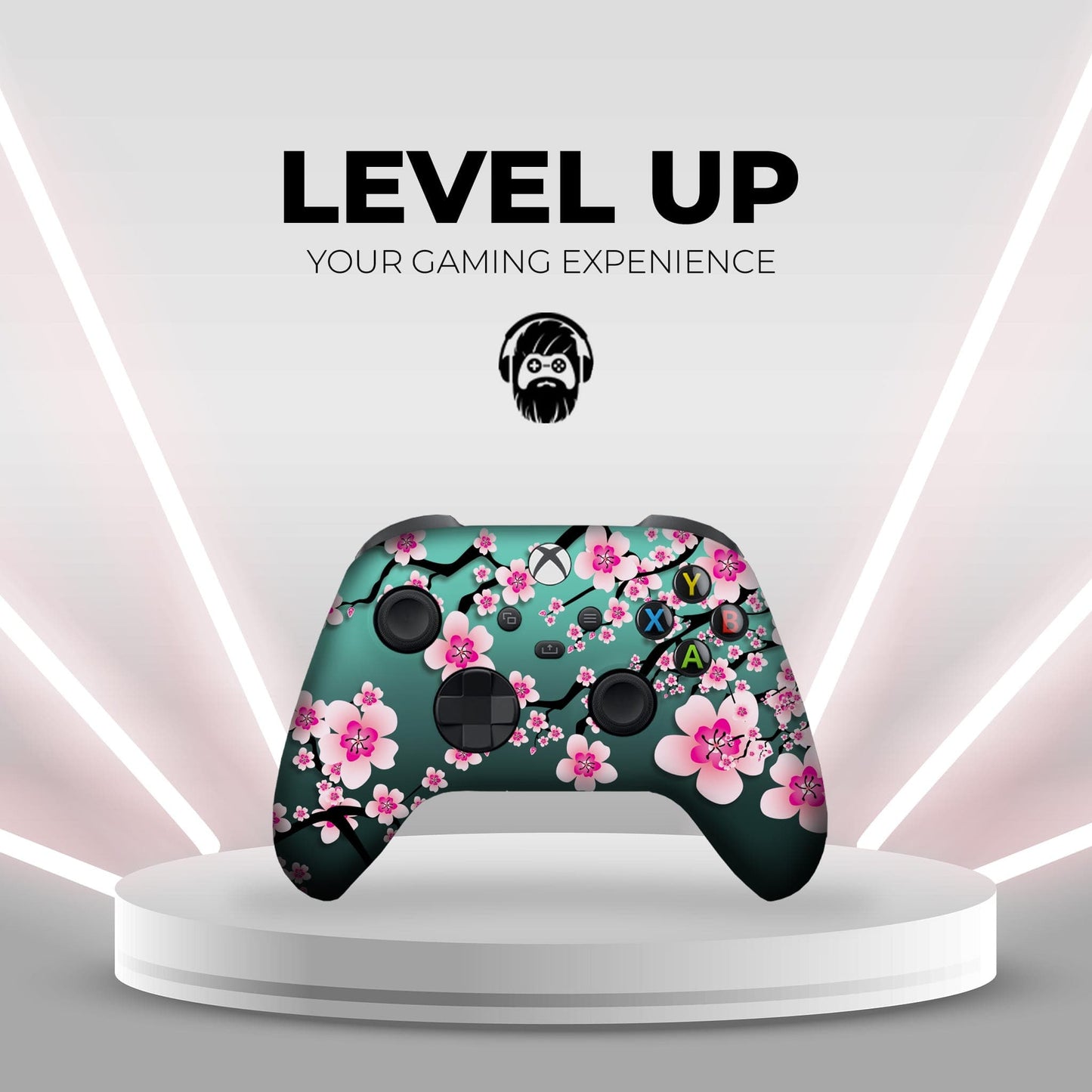 Teal game controller with pink cherry blossom floral print on a display stand