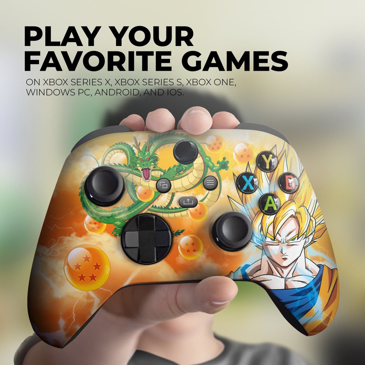 Xbox controller in hand with Goku and Shenron artwork, black thumbsticks and face buttons