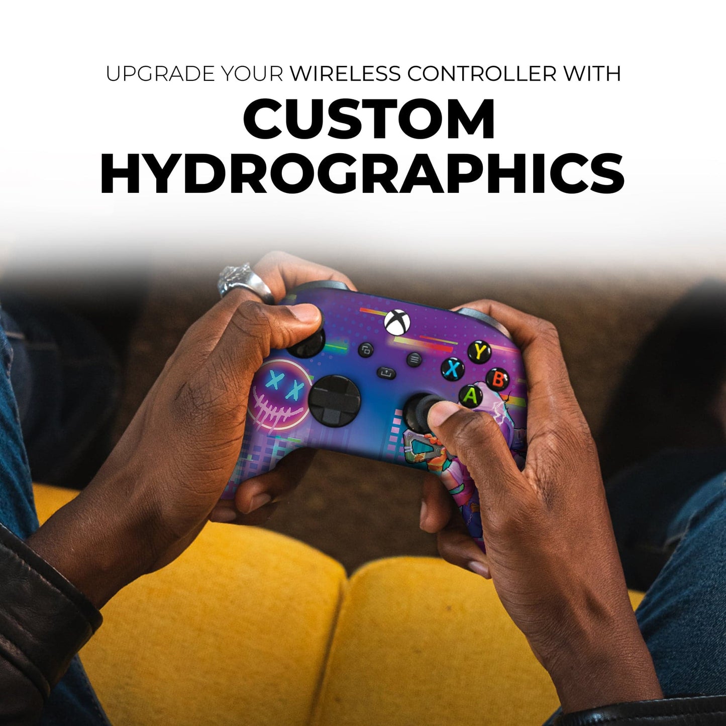 Purple wireless game controller with neon skull graphic and colorful ABXY button icons.