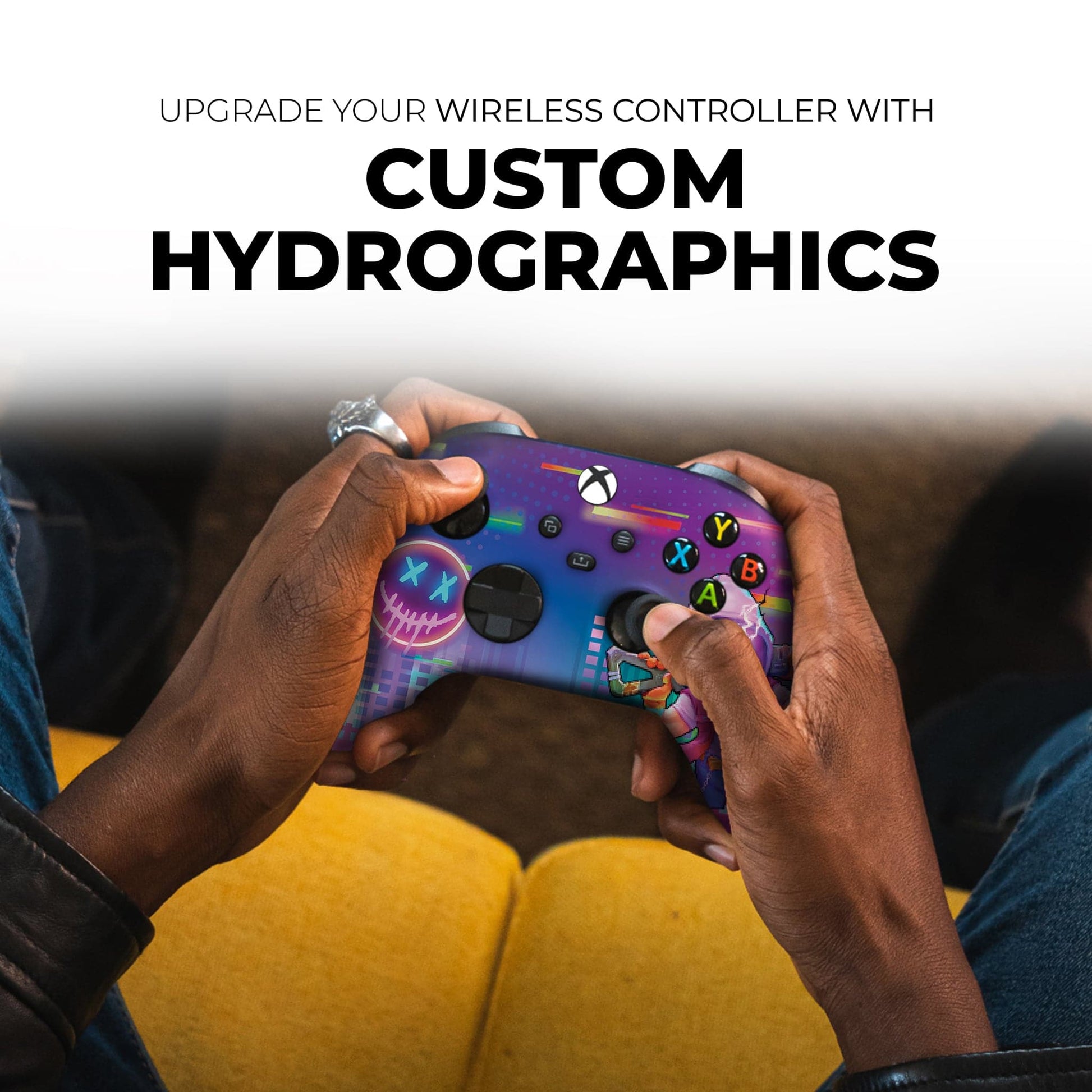 Purple wireless game controller with neon skull graphic and colorful ABXY button icons.
