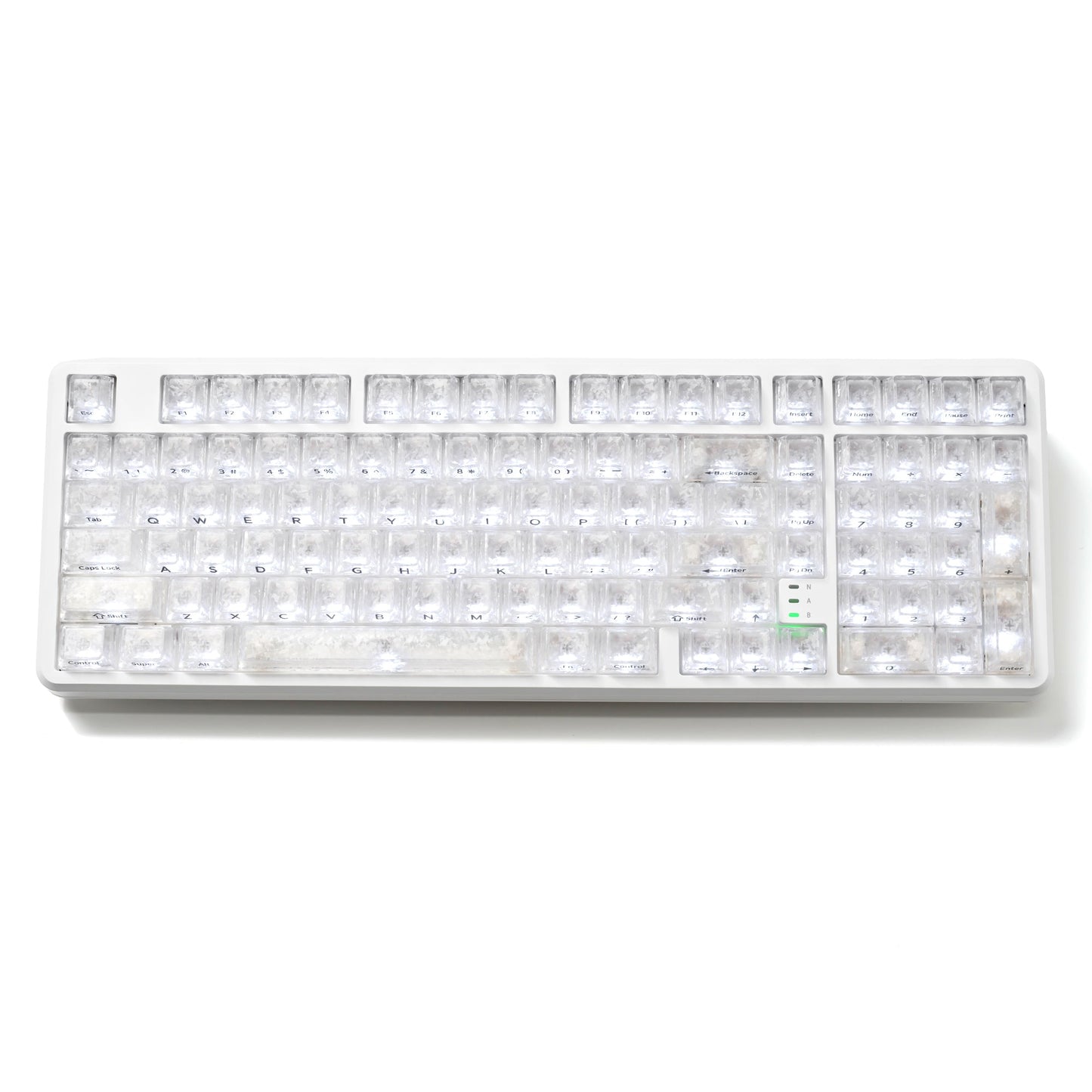 White translucent wireless mechanical keyboard with backlit keys, soft light glow
