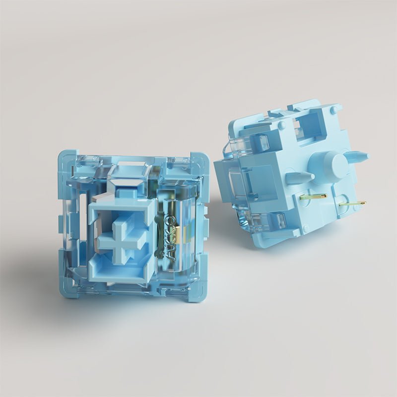 Mechanical keyboard switch with transparent light blue housing and exposed spring