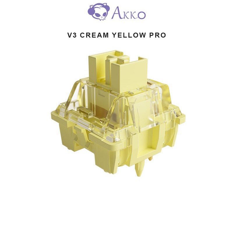 Cream yellow mechanical switch with transparent housing, angled view
