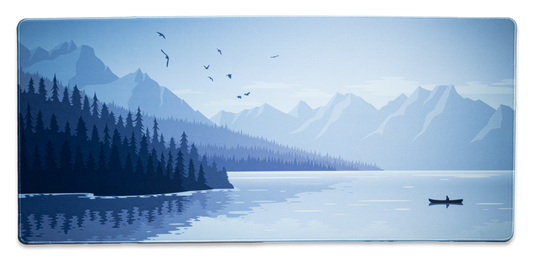 Alberta V2 desk mat with light blue mountain and forest landscape, plane over lake