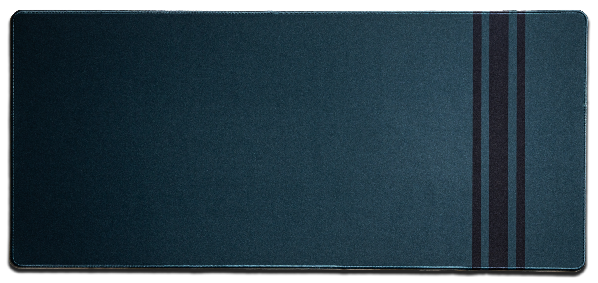 Dark blue desk mat with stitched edges and three vertical stripe accents