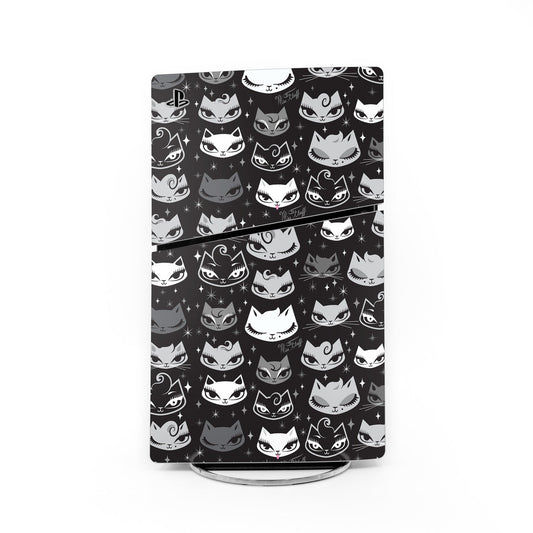 Sony PS5 Slim skin with playful cartoon cat face pattern on dark background