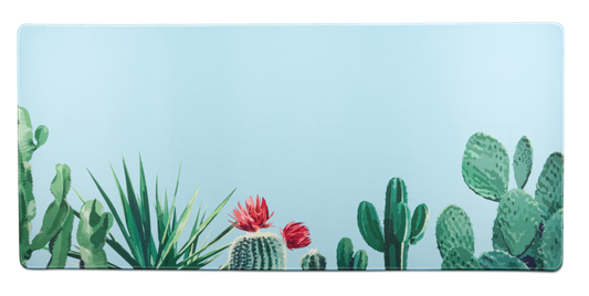 Blue desk mat with colorful cactus and succulent illustration across the surface