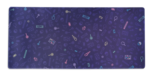 Candy shop desk mat with purple, multicolor candy pattern and rounded edges