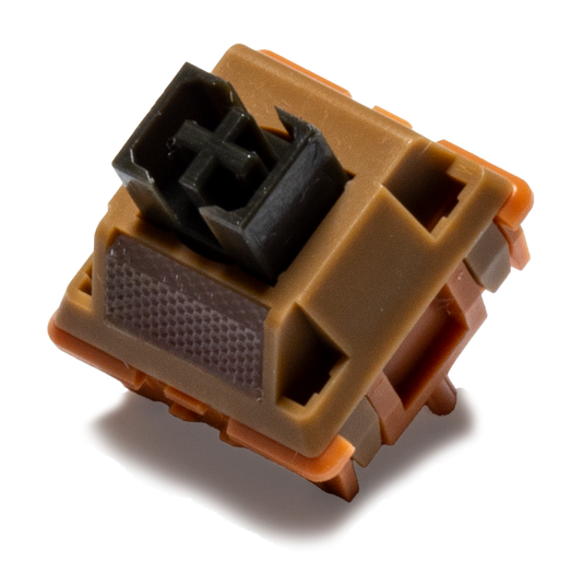 Linear keyboard switches set in tan housing with black stem and metal contacts