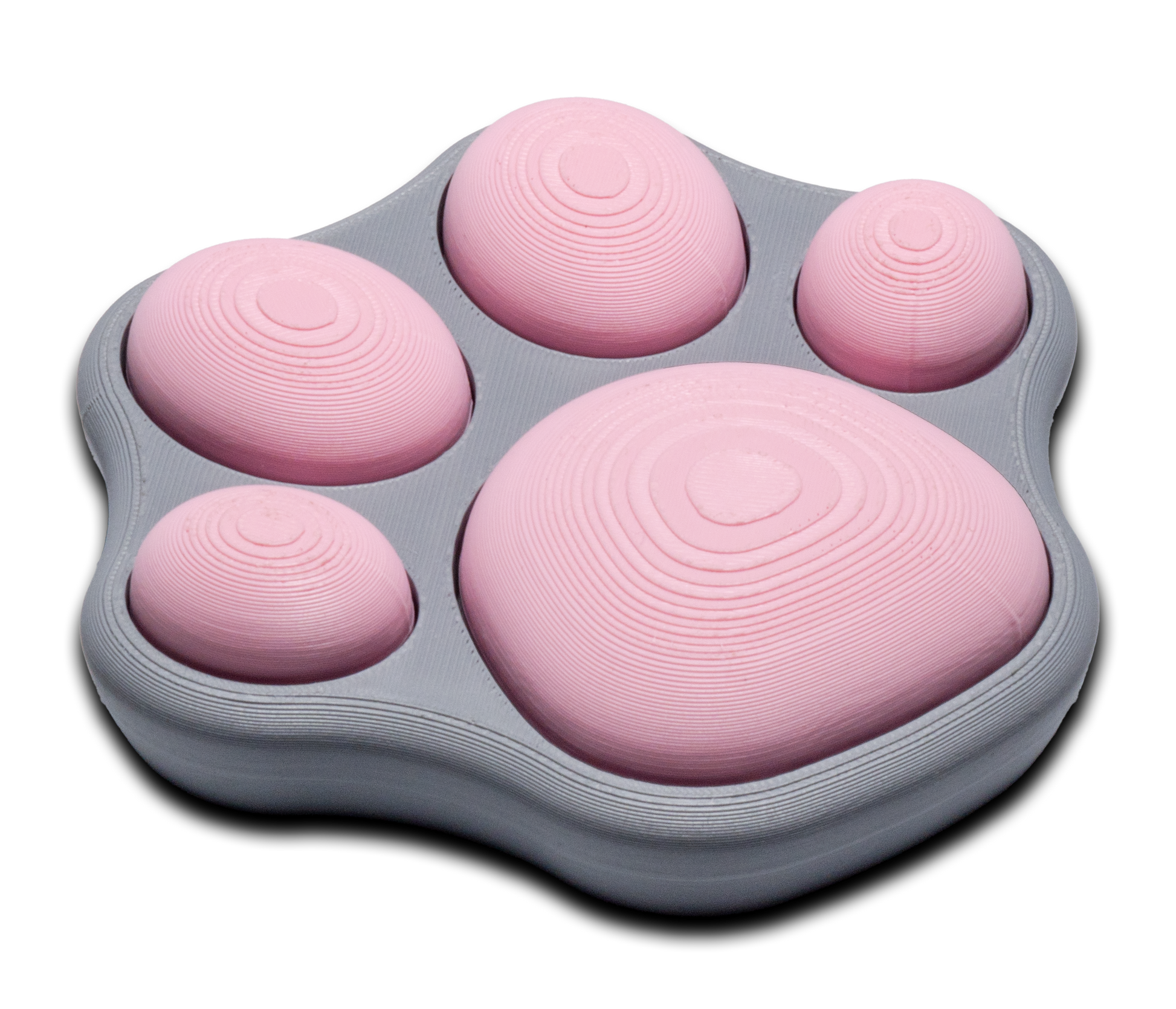 Pink cat-paw fidget with six ridged pads on a gray base, switch-style design
