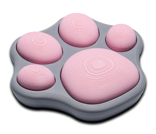Pink cat-paw fidget with six ridged pads on a gray base, switch-style design