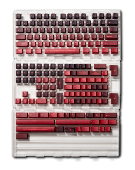 White PBT keycaps set with red letter legends and chained spacebar stripe