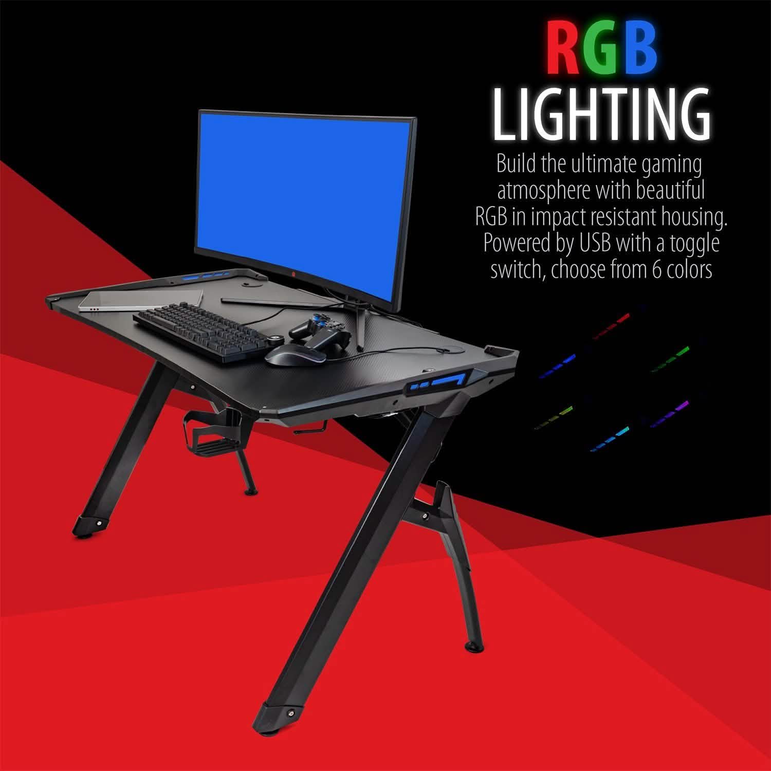 Deco Gear 47 LED gaming desk with RGB lighting, monitor, and keyboard on surface